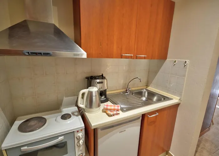 Astacos Gazde/Camere de închiriat